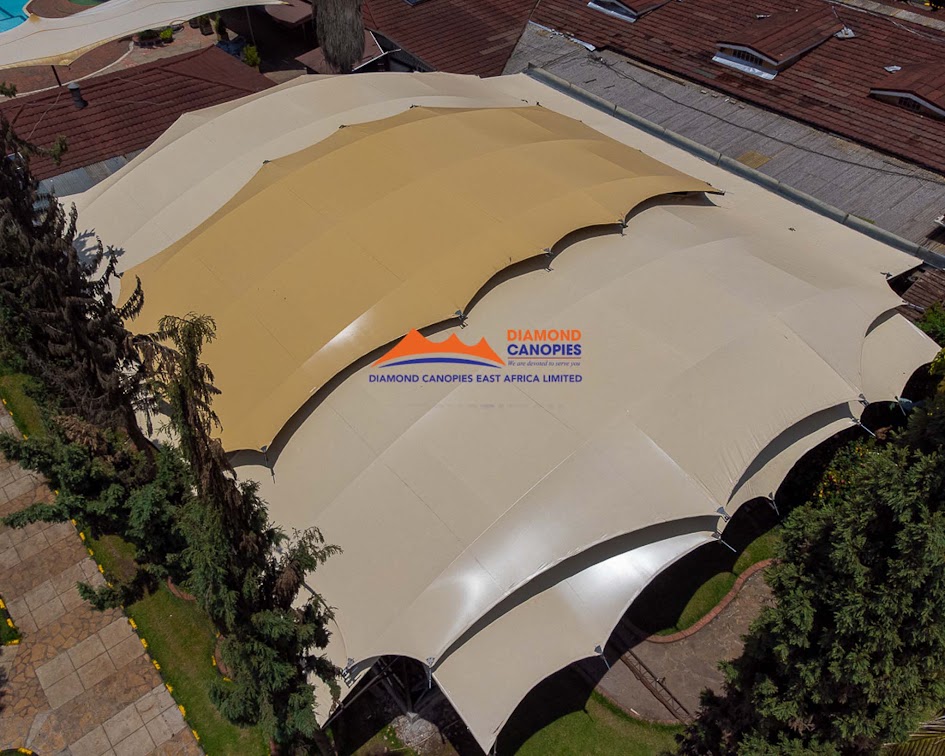 Barrel-vault tensile membrane roof interior by Diamond Canopies
